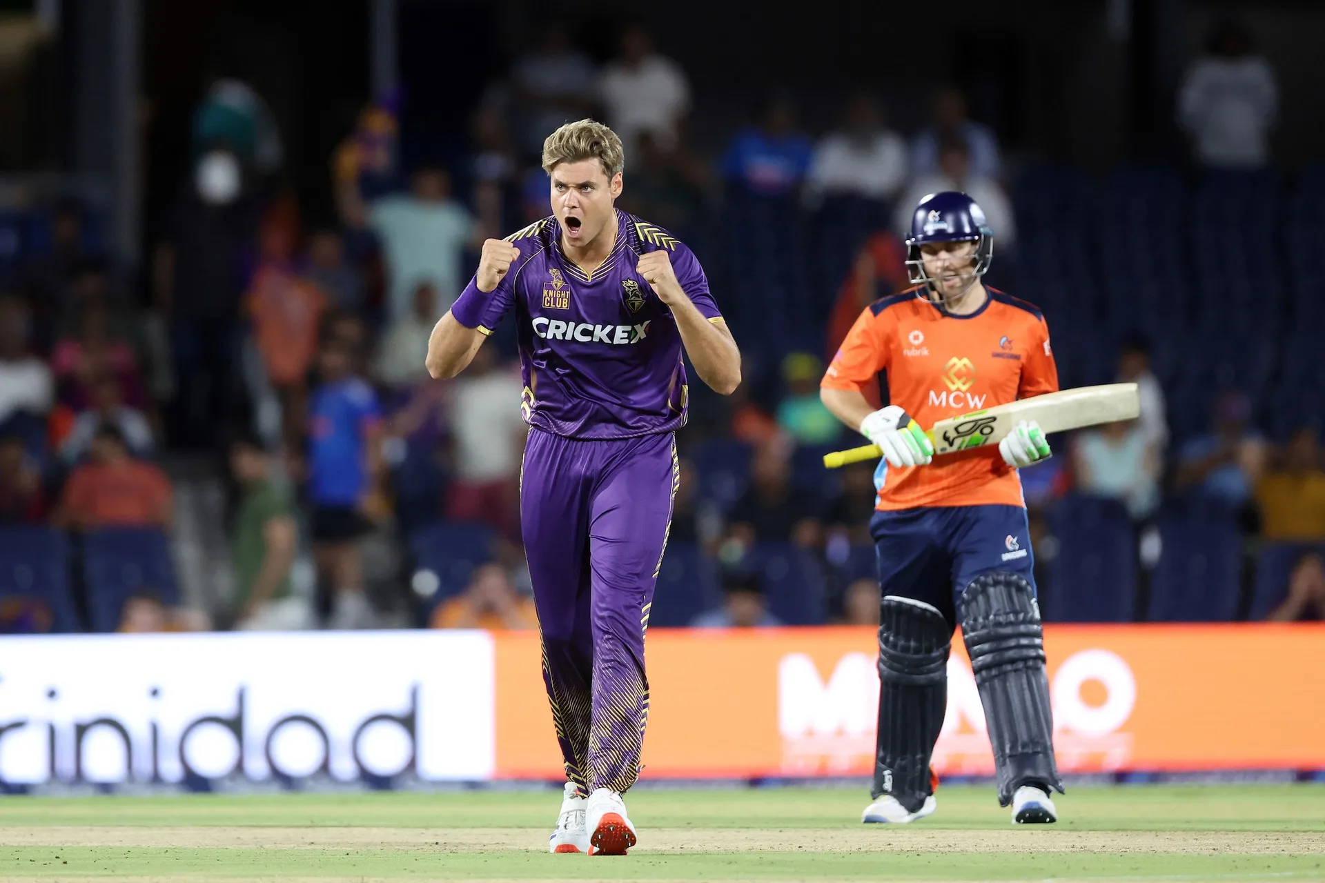 A bowler celebrating a wicket