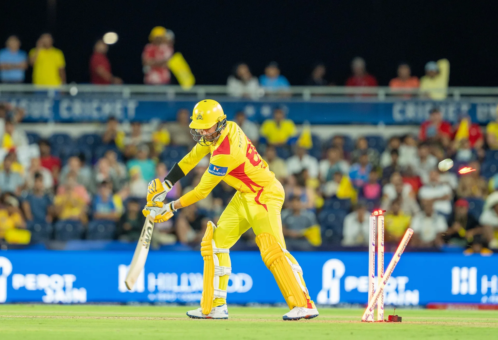 A batter driving through the off side